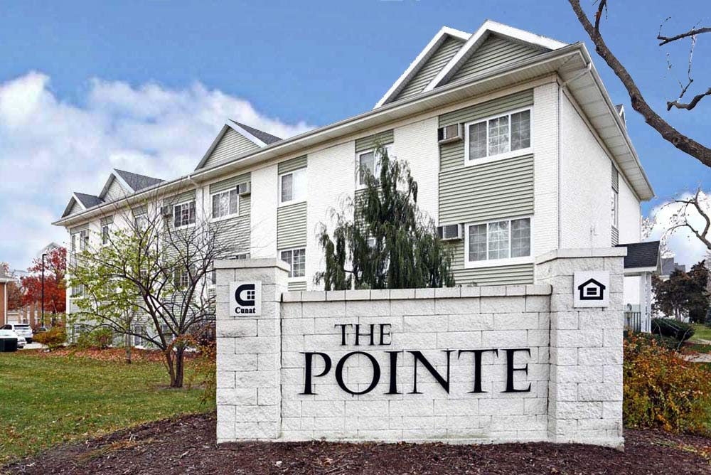 the point apartments exterior shot of sign